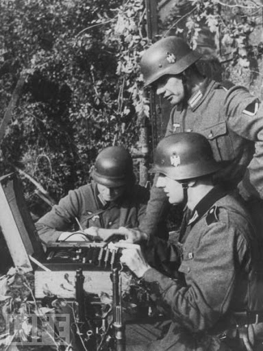 Germans using Enigma